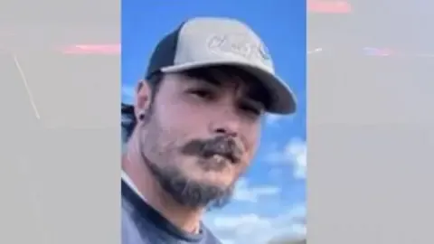 Authorities locate body believed to be American father accused of taking the lives of his daughters